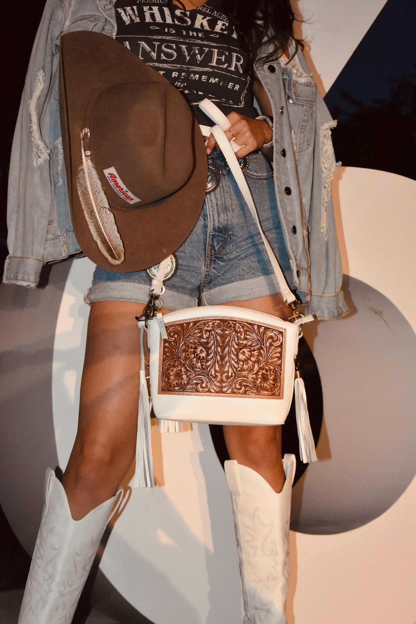 White hand-tooled crossbody